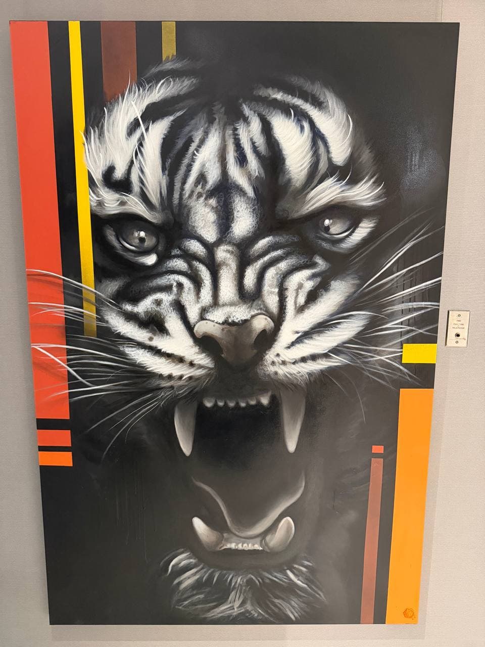 Color Study No.4 Tiger by Rudy Hetzer, a large mixed media tiger portrait in black, white, and gray with bold red, yellow, orange, and bronze vertical color fields.
