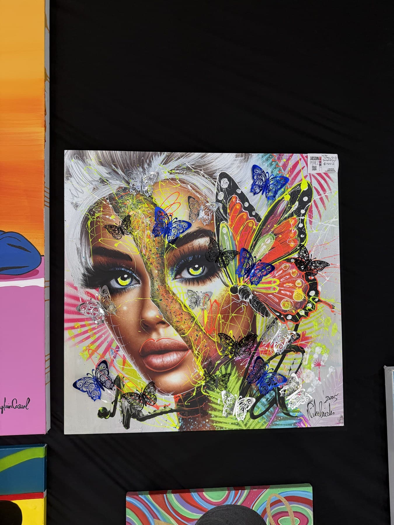 Artwork 21 currently hanging at Revos Gallery, with artist and title details to be confirmed.